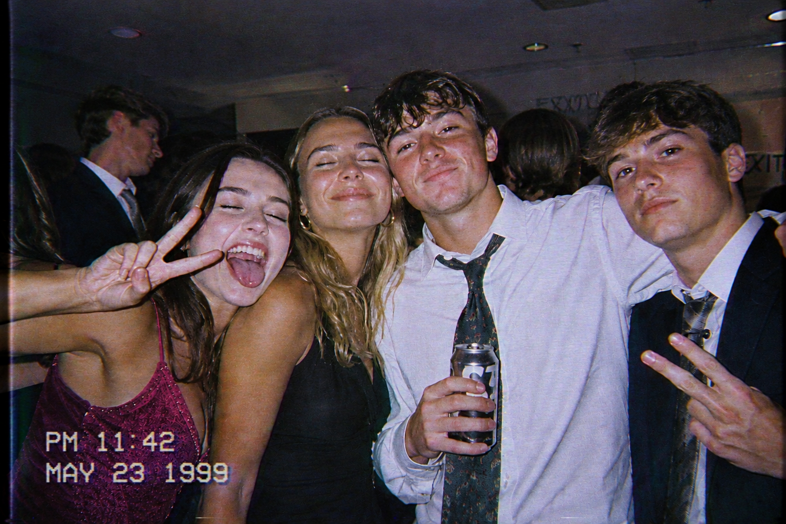 Friends posing at a party with a VHS film look